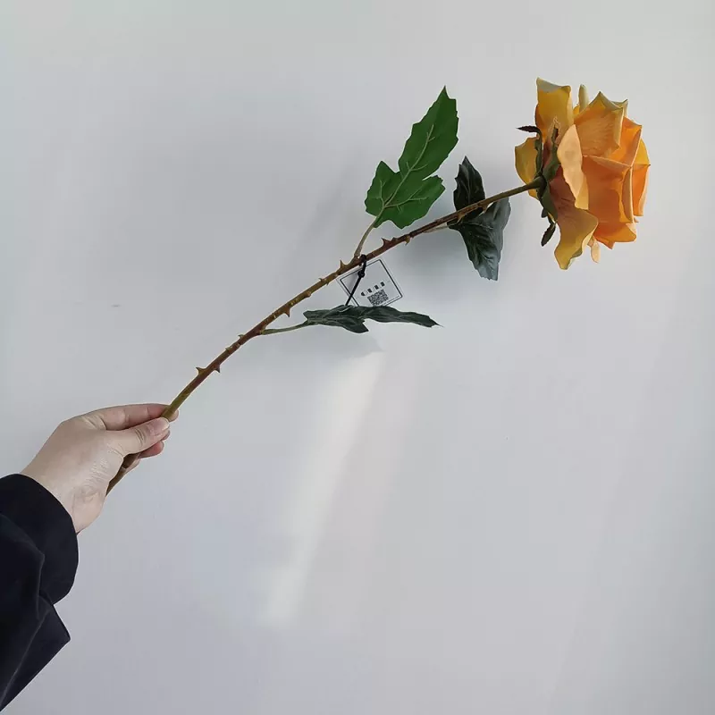 rose silk artificial flower with green leaves